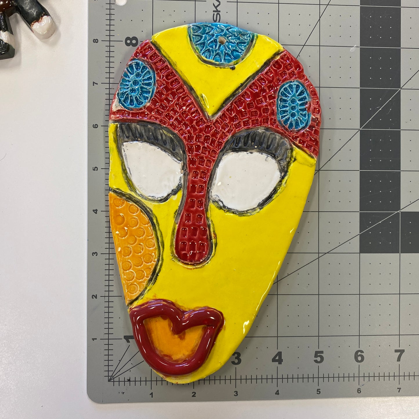 WATCH Resources Art Guild - Ceramic Arts Handmade Clay Crafts 8.5-inch x 5-inch Glazed Mask by Lisa Uptain