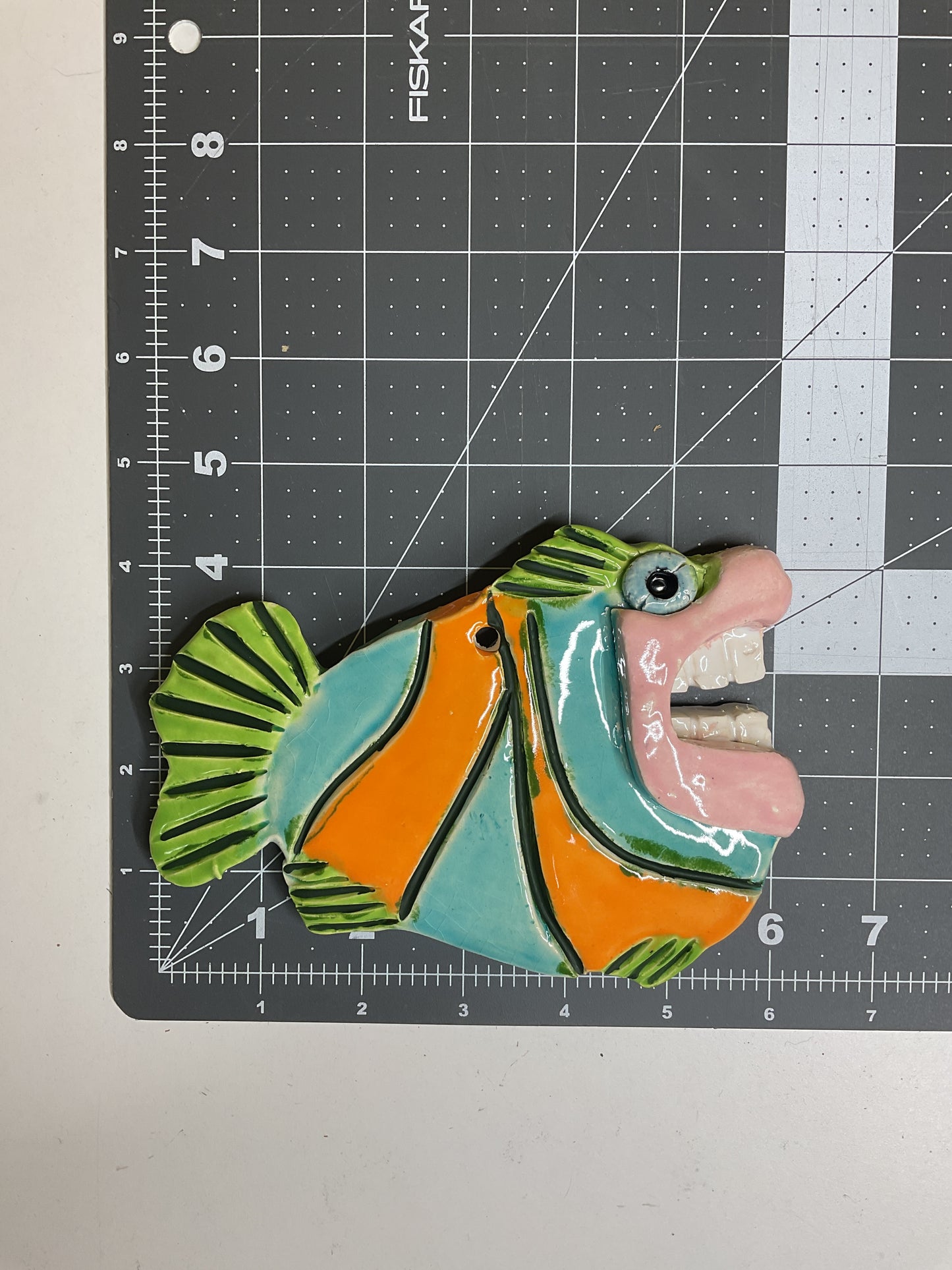Ceramic Arts Handmade Clay Crafts Glazed Fish with Teeth 6-inch by 4.5-inch made by Lisa Uptain and Anonymous 4676