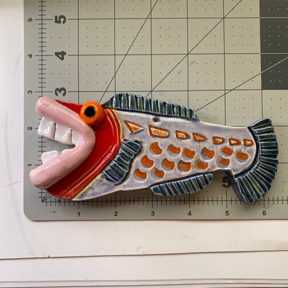 Handmade Ceramic Arts: Glazed Fish with Lips and Teeth 7-inch x 3-inch by Eric Stacy