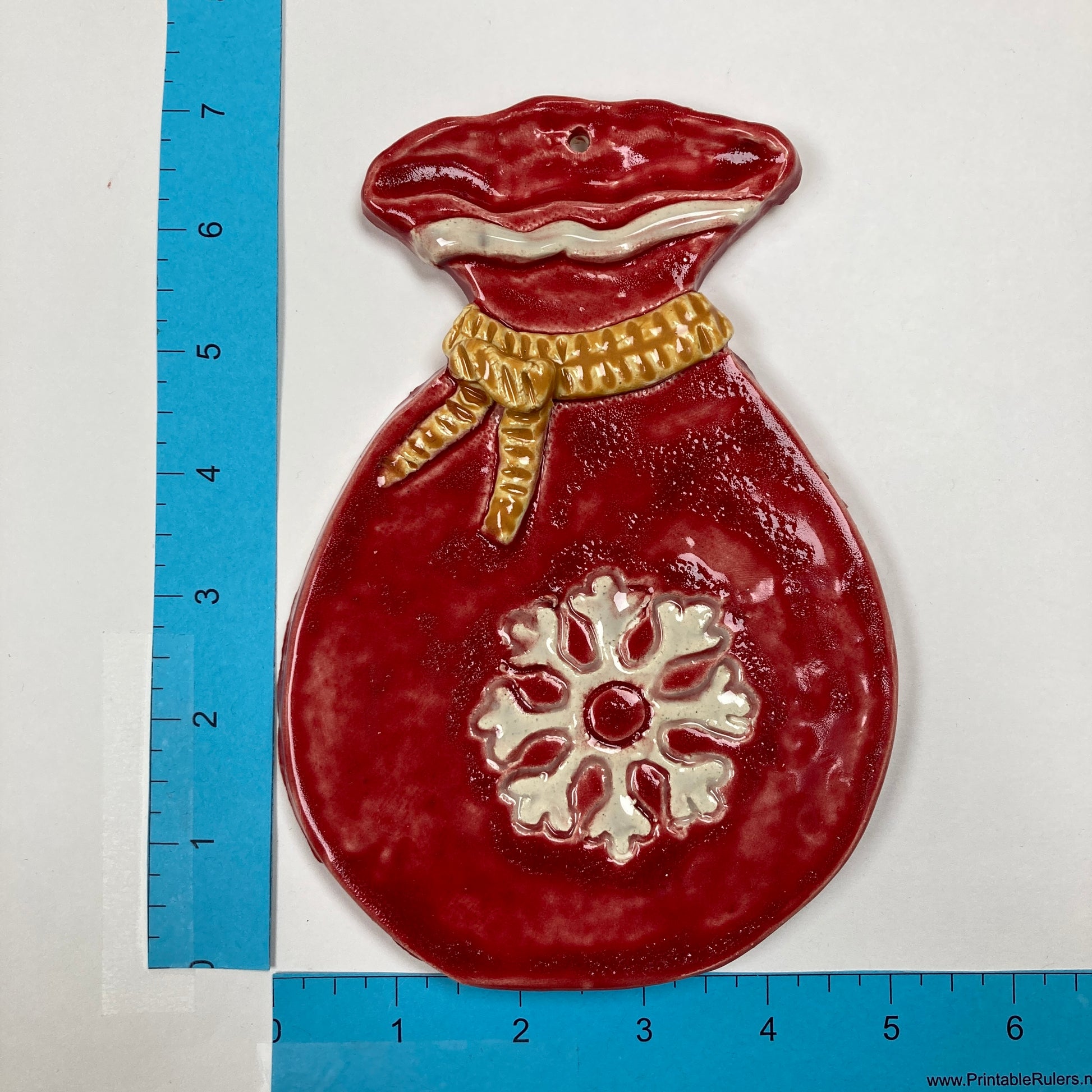 WATCH Resources Art Guild - Ceramic Arts Handmade Clay Crafts 7-inch x 5-inch Glazed Christmas Bag made by Lisa Uptain
